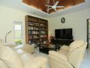 Spacious living room with modern furniture and wooden ceiling