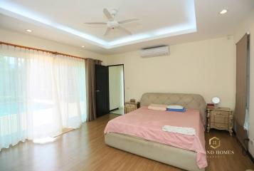 Spacious bedroom with natural lighting