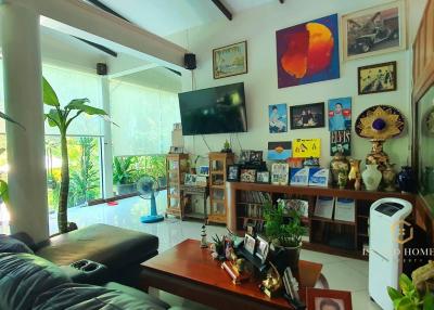 Spacious and well-lit living room with modern decor