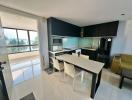 Modern kitchen with ocean view and integrated dining area