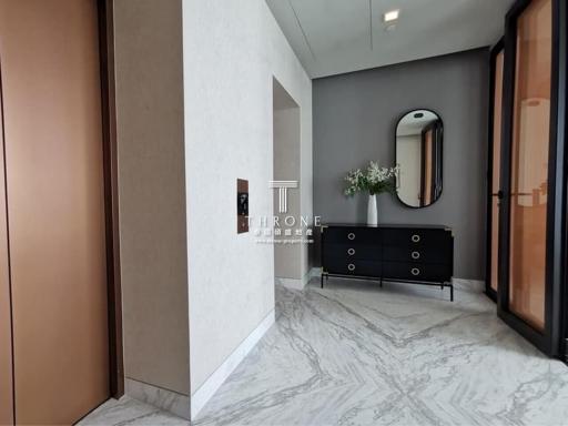 Elegant entryway with marble flooring and modern decor