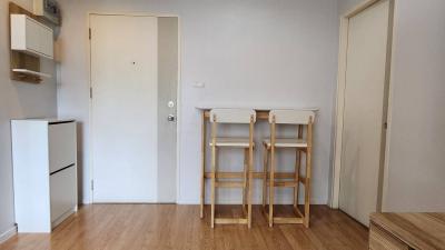 Compact kitchen with modern appliances and breakfast nook