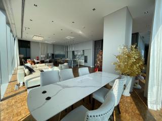 Spacious and modern living room with dining area