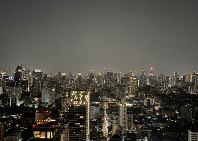 Nighttime cityscape view from a high-rise building