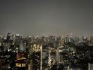 Nighttime cityscape view from a high-rise building