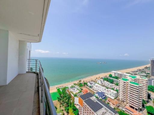 High-rise balcony view overlooking the beach and the ocean