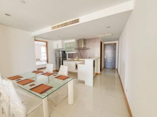 Modern kitchen with adjacent dining area in a bright apartment