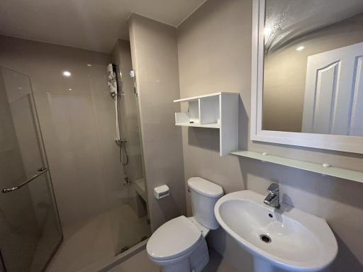 Modern bathroom with walk-in shower and vanity