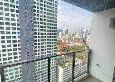 High-rise apartment balcony with city view