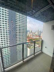 High-rise apartment balcony with city view