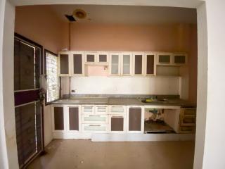 Spacious kitchen with ample cabinetry and natural light