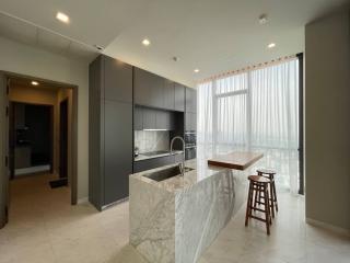 Modern kitchen with marble island and panoramic window view