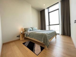 Modern bedroom with natural light and minimalist design