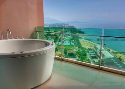 Luxurious bathroom with ocean view and large bathtub