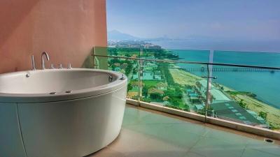 Luxurious bathroom with ocean view and large bathtub