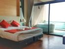 Spacious bedroom with ocean view, en-suite bathroom and natural light