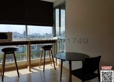 High-rise apartment interior view with cityscape