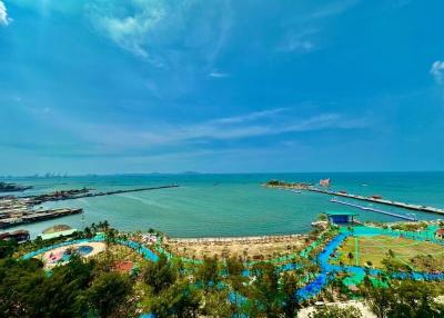 Panoramic ocean view with clear blue sky and coastal amenities