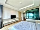 Modern bedroom with adjoining balcony and scenic view