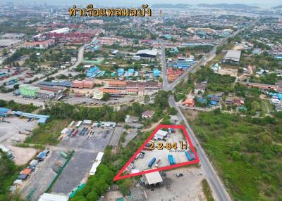 Aerial view of a property with layout boundary marked