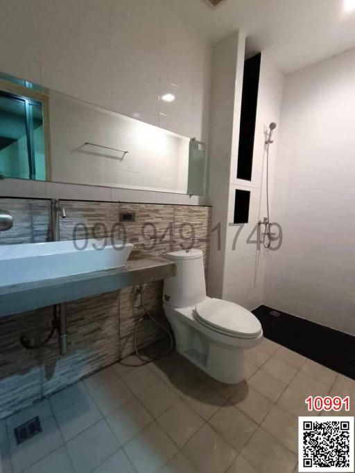 Modern bathroom interior with toilet and sink