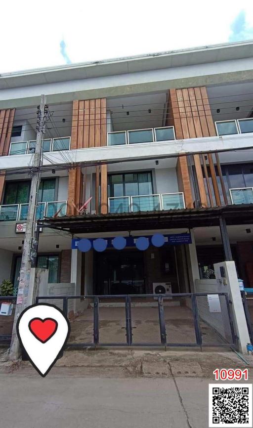 Exterior view of a modern residential building with balconies