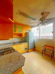 Bright kitchen with modern appliances and ample cabinets