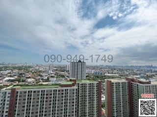 Panoramic city view from a high-rise apartment balcony