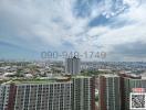 Panoramic city view from a high-rise apartment balcony