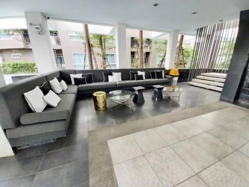 Spacious and modern living room with large sectional sofa