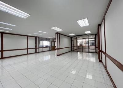 Spacious open-plan commercial interior with bright lighting