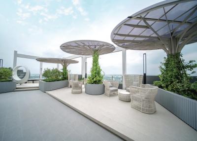 Elegant rooftop terrace with modern furniture and panoramic view