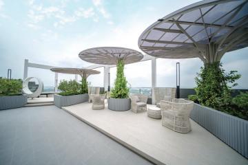 Elegant rooftop terrace with modern furniture and panoramic view