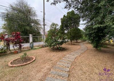 Lovely property with 2 homes on a large plot of land with many fruit trees at Muang Kaew, Mae Rim