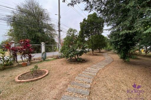 Lovely property with 2 homes on a large plot of land with many fruit trees at Muang Kaew, Mae Rim