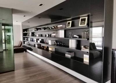 Modern living room interior with large shelving unit