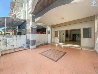 Spacious patio area with tiled flooring and open entrance