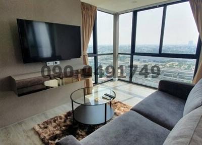 Contemporary living room with expansive city views