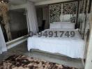 Elegant bedroom with a queen-sized bed, mirrored wardrobe, and decorative wall panels