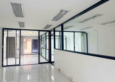 Spacious and bright office interior with glass partitions