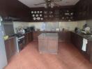 Spacious kitchen with central island and modern appliances