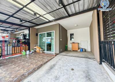 Spacious garage with tiled floor and organized storage space