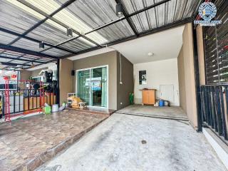 Spacious garage with tiled floor and organized storage space