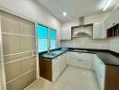 Modern kitchen with ample countertops and storage cabinets