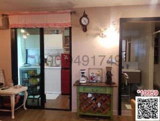 Cozy kitchen with red appliances and a traditional wooden cabinet