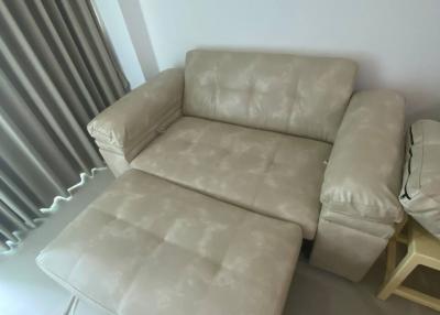 Beige sofa in a modern living room setting