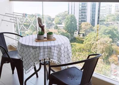 Bright and airy balcony with a view and dining setup