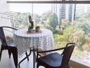 Bright and airy balcony with a view and dining setup