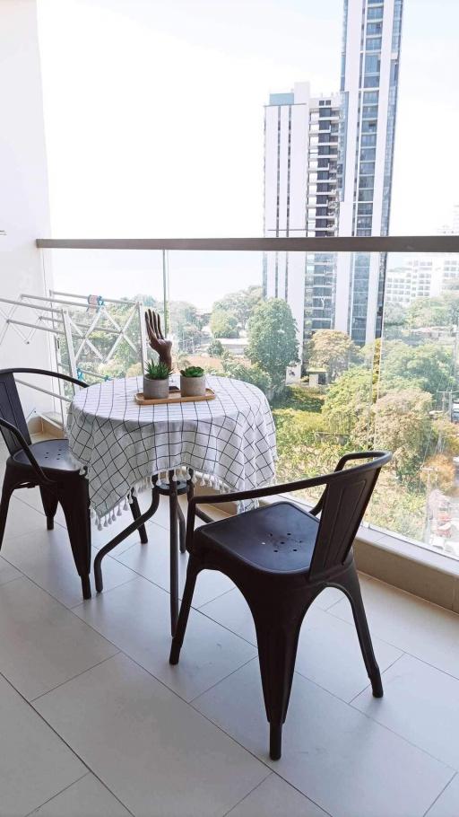 Bright and airy balcony with a view and dining setup