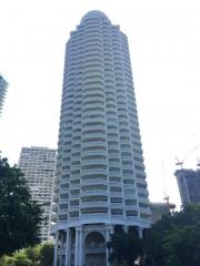 Tall residential building with multiple balconies